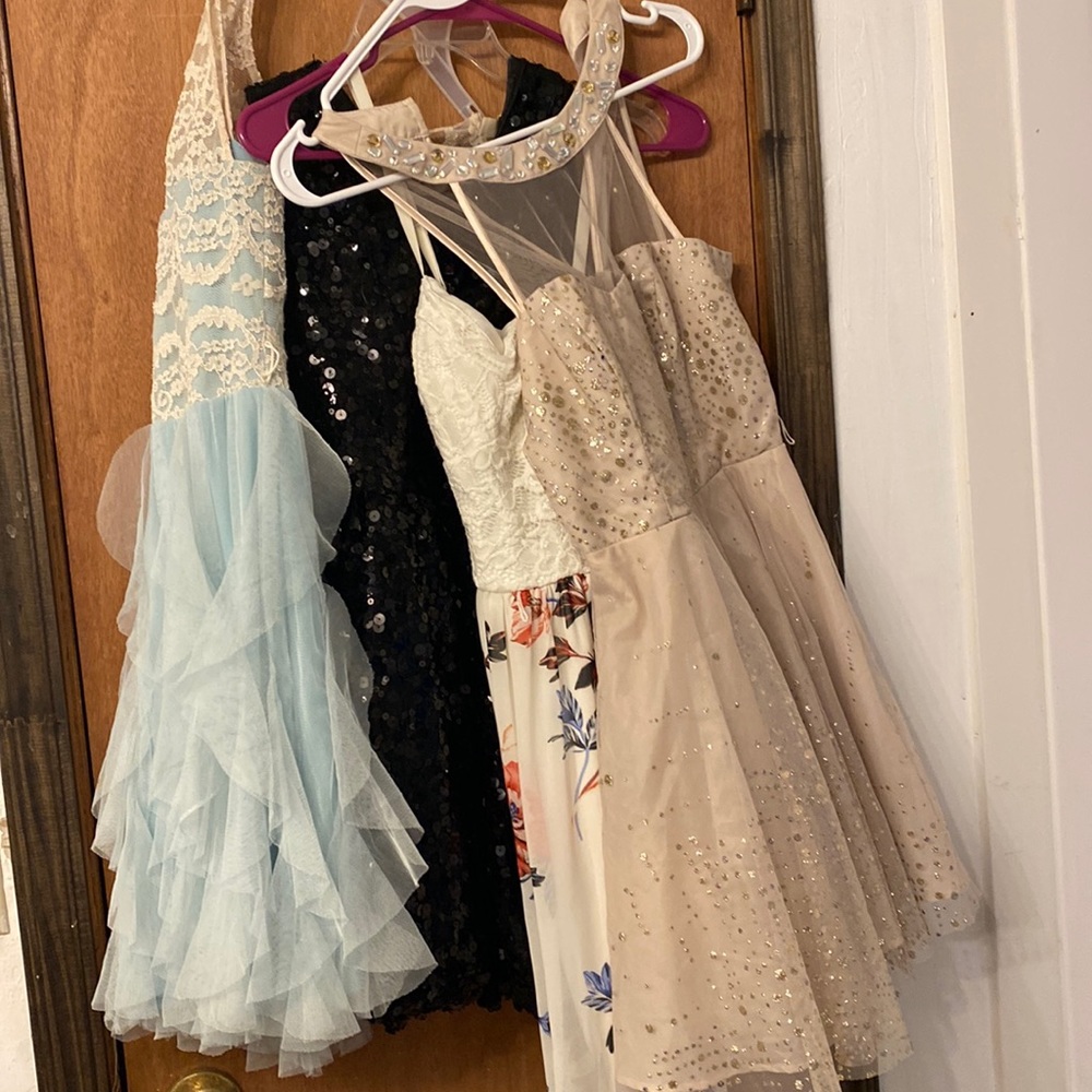 4 formal dresses.  Selling all for $50 or $15 each.